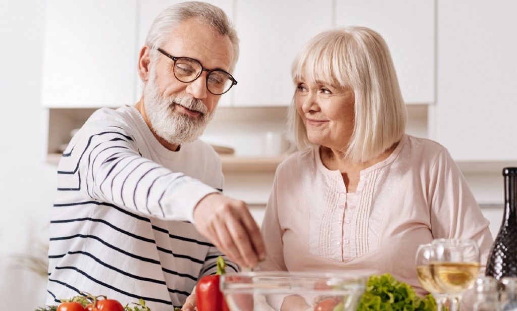 You & I Care, home care, live-in Care Services, optimistic elderly couple having a good time at home.