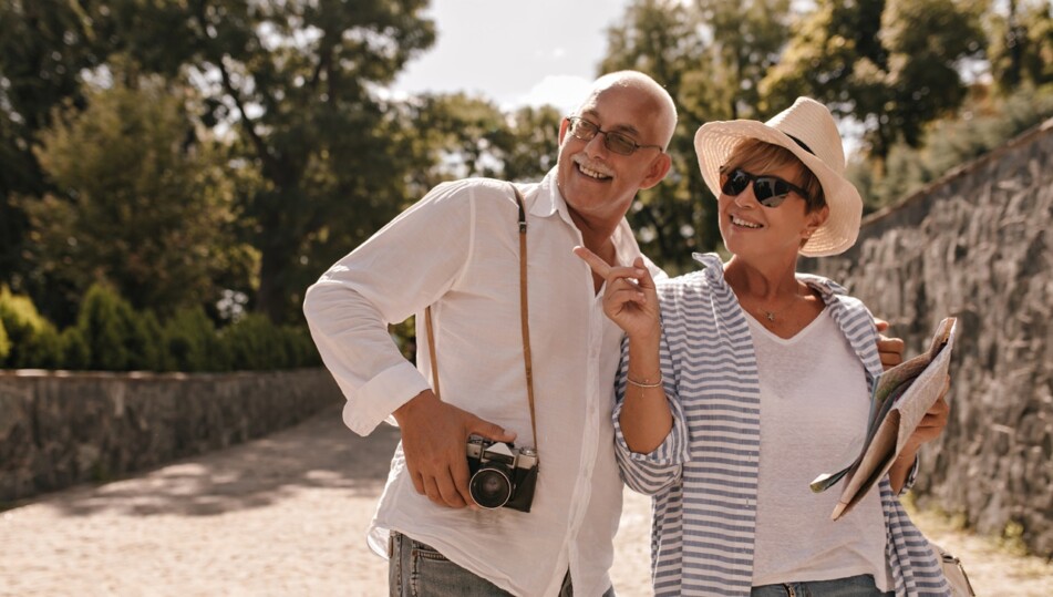 Happy senior lady and gentleman on holiday