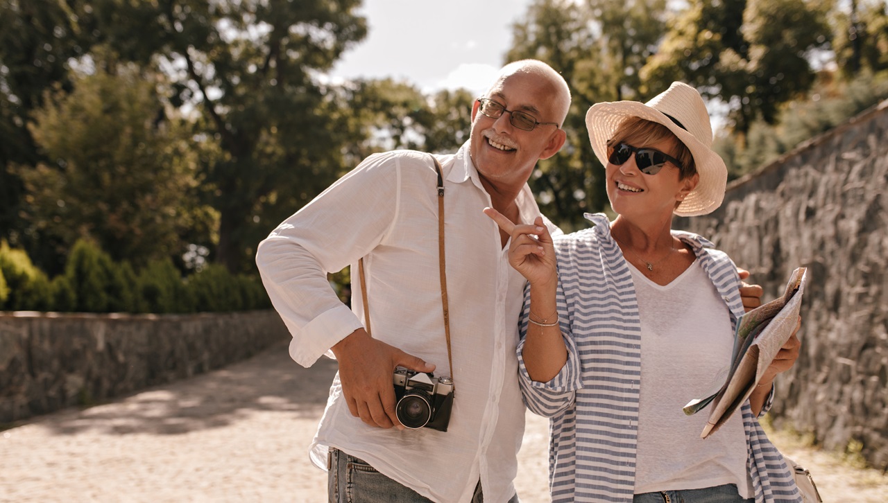 Happy senior lady and gentleman on holiday